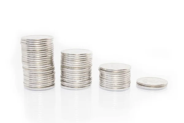 Üzleti pénzt grafikon érmék fehér alapon — Stock Fotó