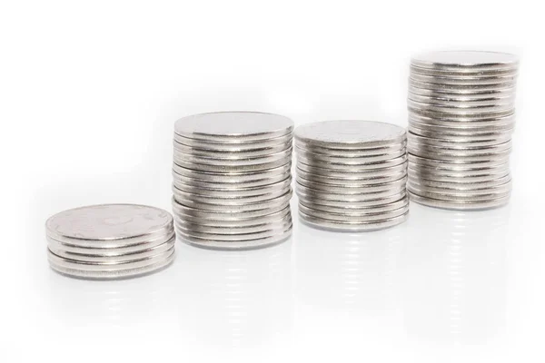 Dinero de negocios gráfico monedas sobre fondo blanco — Foto de Stock