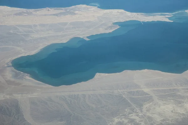 Beautiful earth and sea from a window airplane background