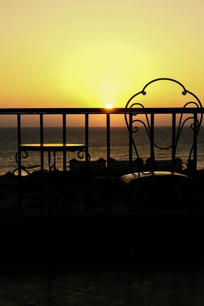 Very beautiful silhouette of chairs on the seashore of the sea — Stock Photo, Image