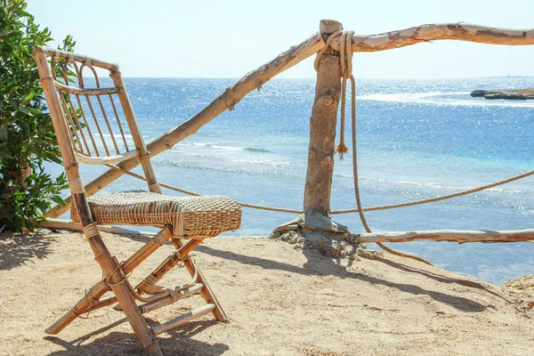Stylishly beautiful chair on the sea nature landscape background — Stock Photo, Image