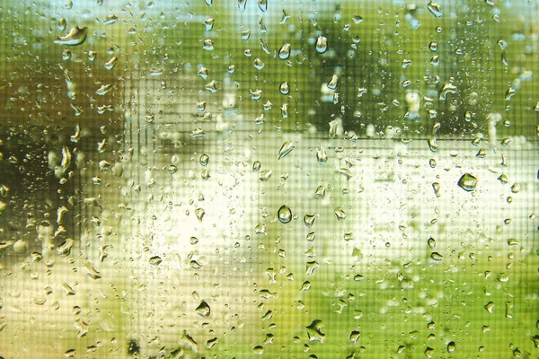 Hintergrund plätschert durch das Glas der Natur des Wassers — Stockfoto