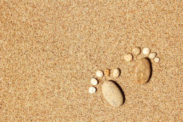 Hermosas huellas en la arena mar naturaleza fondo —  Fotos de Stock