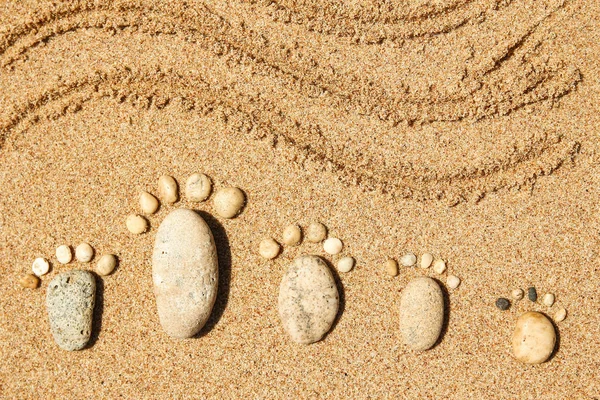 Krásné stopy v písku moře příroda pozadí — Stock fotografie
