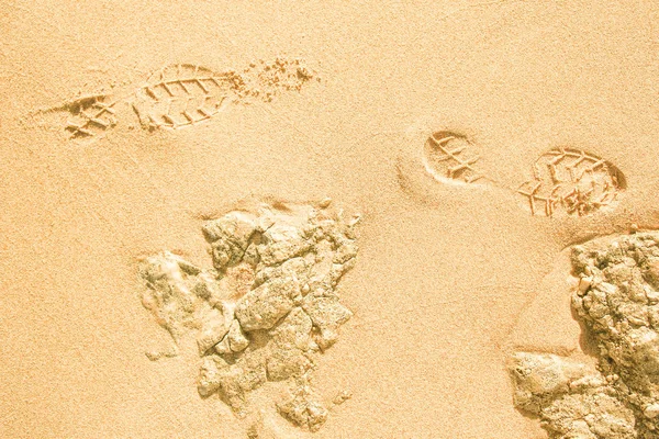 Schöne Fußabdrücke im Sand Meer Natur Hintergrund — Stockfoto