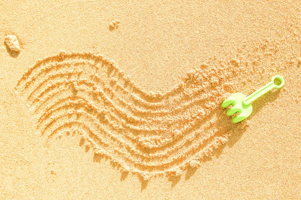 Belo desenho na areia do fundo do mar — Fotografia de Stock