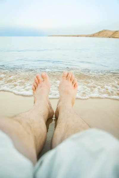 Beautiful traces with feet on sea nature background — Stock Photo, Image