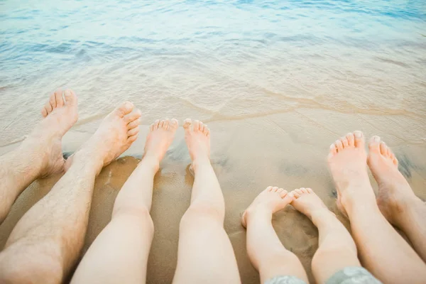 Beautiful traces with feet on sea nature background