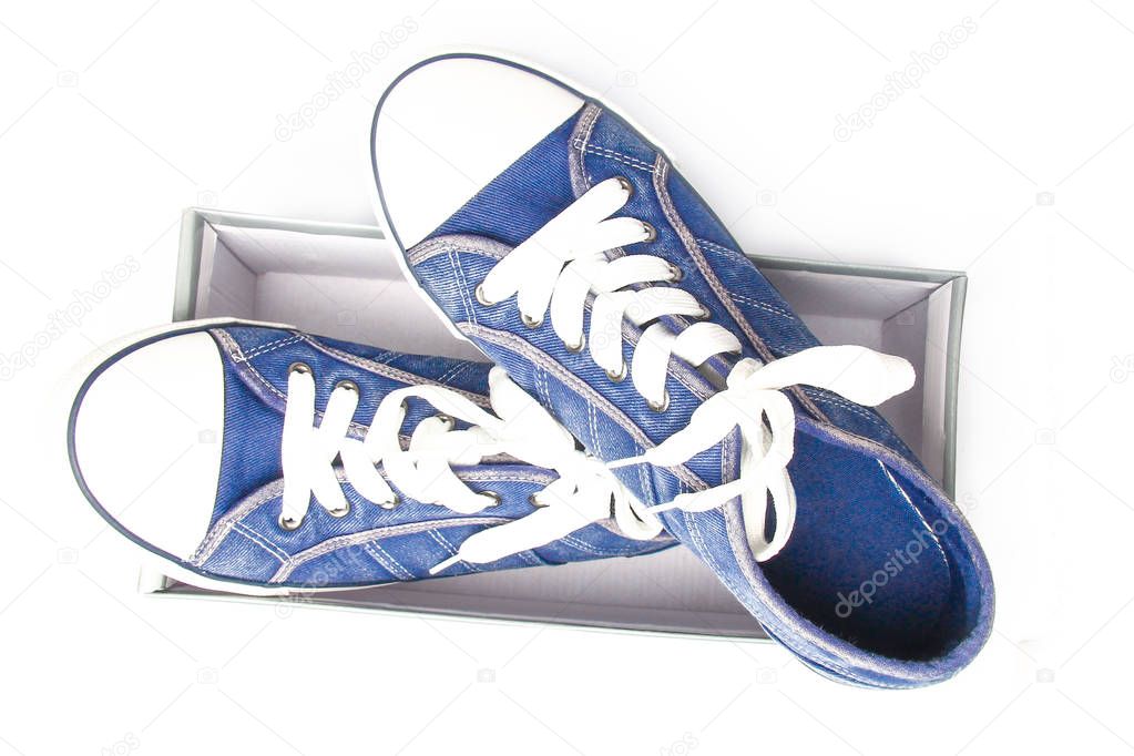 stylish shoes for the sport in a box on a white background