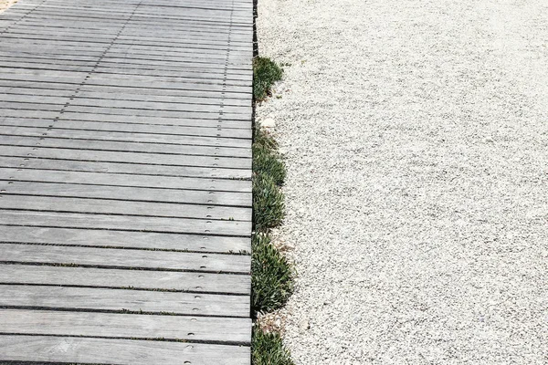 Mooie houten en zand achtergrond aan de kust — Stockfoto