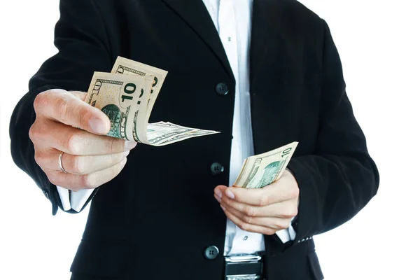 Affärsman som håller pengar på vit bakgrund — Stockfoto