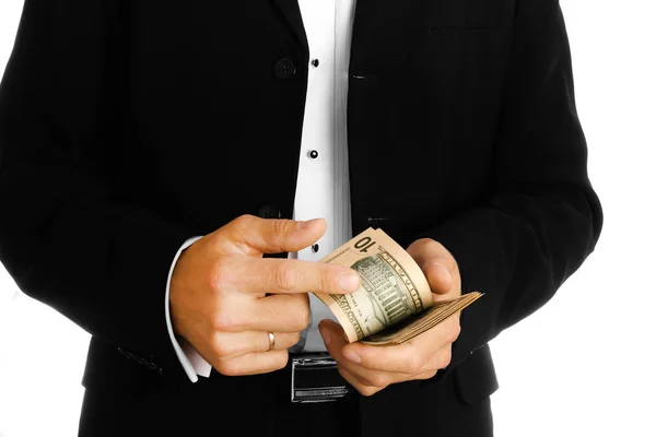 Homem de negócios segurando dinheiro em fundo branco — Fotografia de Stock