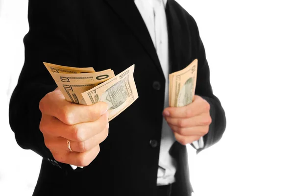 Business man holding money on white background — Stock Photo, Image