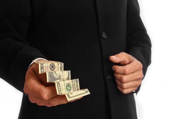 Business man holding money on white background — Stock Photo, Image