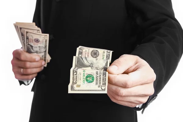 Business man holding money on white background — Stock Photo, Image