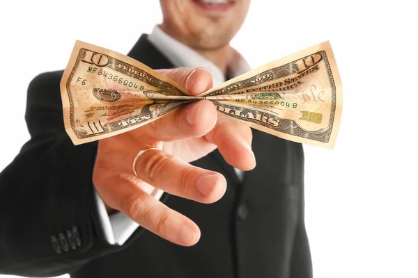 Business man holding money on white background — Stock Photo, Image