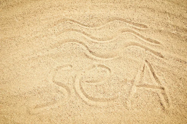 Hermoso dibujo sobre la arena del fondo marino — Foto de Stock