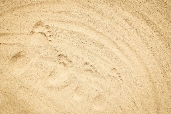 Schöne Zeichnung auf dem Sand des Meereshintergrunds — Stockfoto
