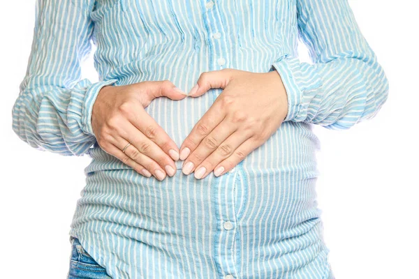 Happy pregnant girl lies on white background — Stock Photo, Image