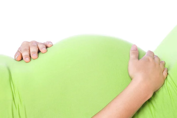 快乐的怀孕女孩躺在白色的背景下 — 图库照片