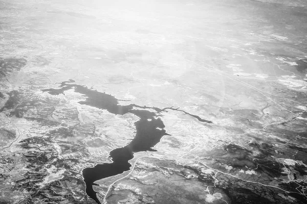 Beautiful earth and sea from a window airplane background