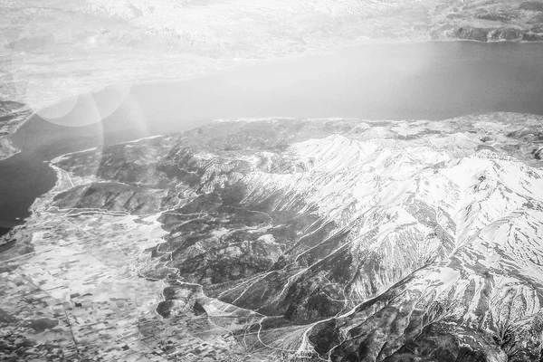 Beautiful earth and sea from a window airplane background