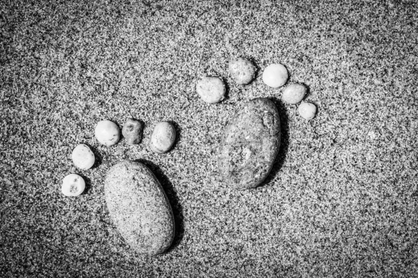 Beautiful footprints in the sand sea nature background — Stock Photo, Image