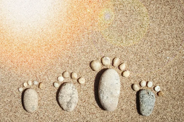 Pegadas bonitas na areia mar natureza fundo — Fotografia de Stock