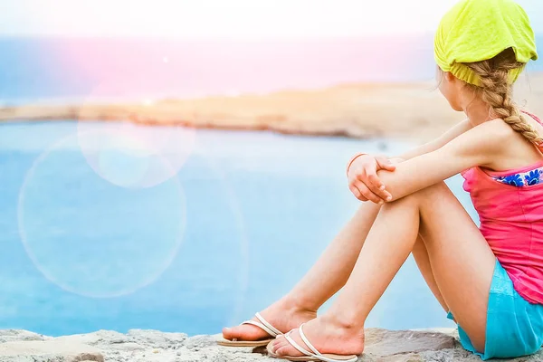 Happy child playing on the sea background — Stock Photo, Image