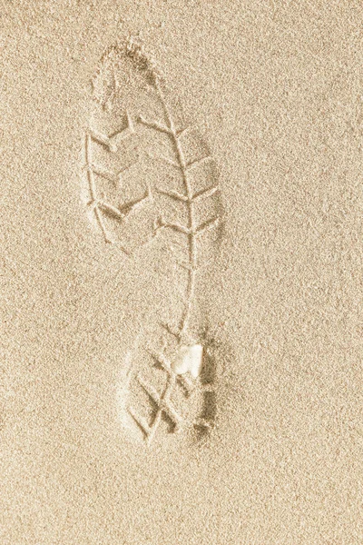 Beautiful footprints in the sand sea nature background — Stock Photo, Image