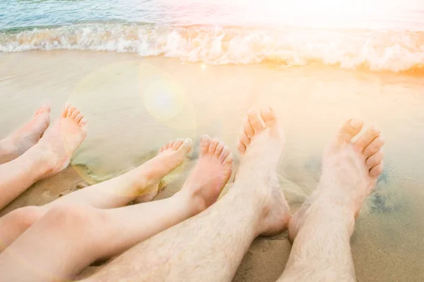 Beautiful traces with feet on sea nature background