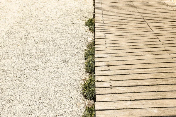 Beautiful wooden and sand background on the seashore — Stock Photo, Image