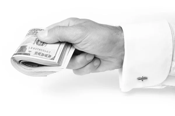 Dinheiro de negócios dólares nas mãos em um fundo branco — Fotografia de Stock