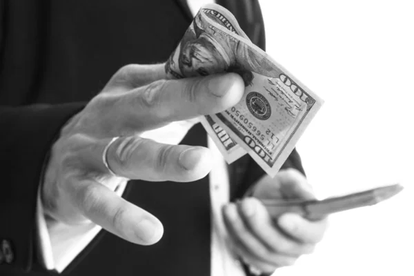 Business man holding money on white background — Stock Photo, Image