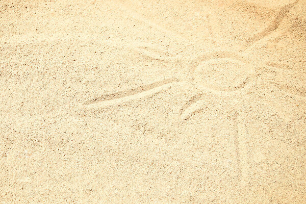 Beautiful drawing on the sand of the sea background