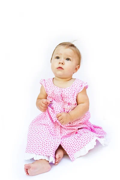 Feliz bebê menina bonita em um fundo branco — Fotografia de Stock