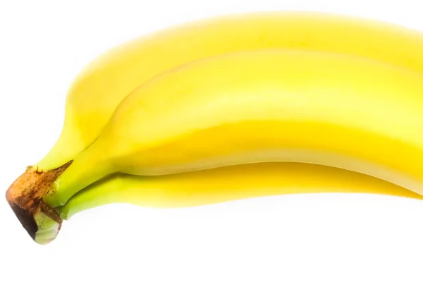 Krásné a chutné banány na bílém pozadí — Stock fotografie
