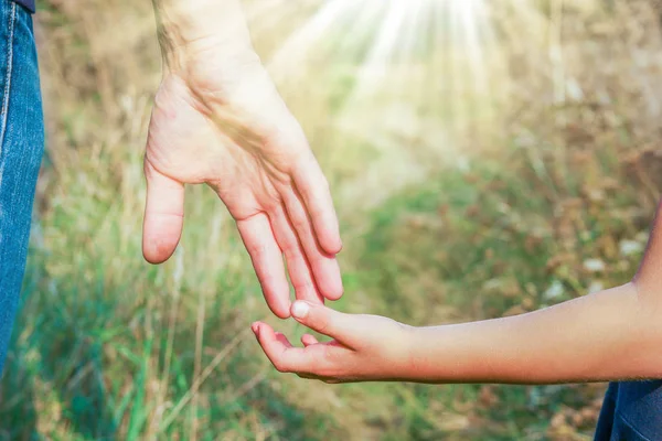 Beautiful hands outdoors in a park — Stock Photo, Image