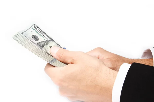 Business Money dolarů v rukou na bílém pozadí — Stock fotografie