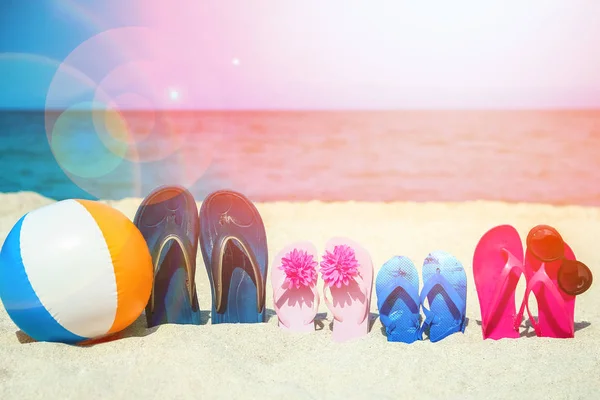 Beautiful slippers in the sand by the sea greece on nature backg — Stock Photo, Image
