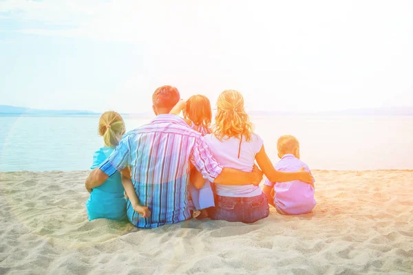 Happy family at sea in greece on nature background — Stock Photo, Image
