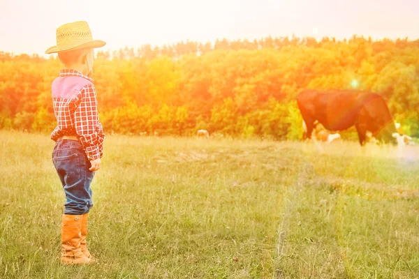 Happy baby cowboy in nature — Stock Photo, Image