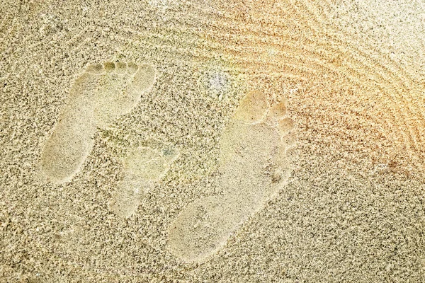 Beau motif sur le sable de la mer sur fond de nature — Photo