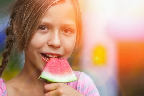 Happy child with watermelon on nature in the park — Stock Photo, Image