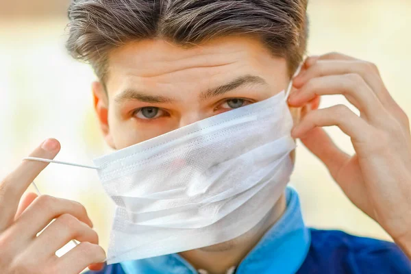 masked man from coronavirus and air. Protection against PM 2.5 air polluted from the virus in Europe and Asia