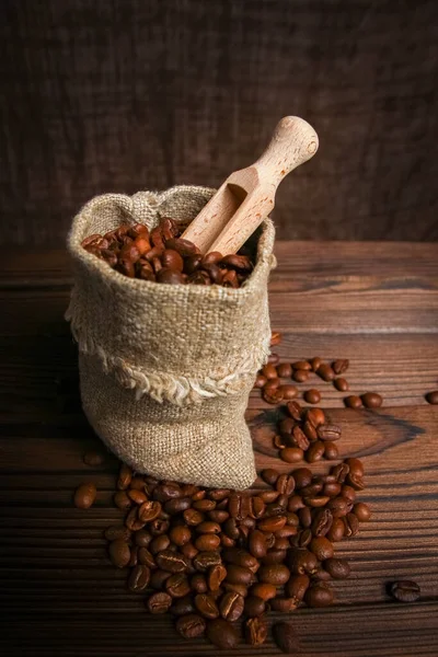 a coffee bean bag on wooden background