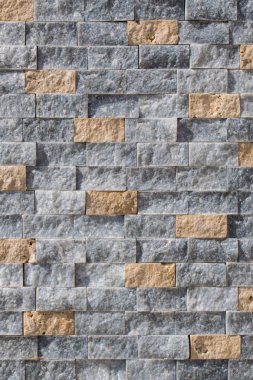 Taş tuğla ustası. Dikey arkaplan dokusu. Kapat..