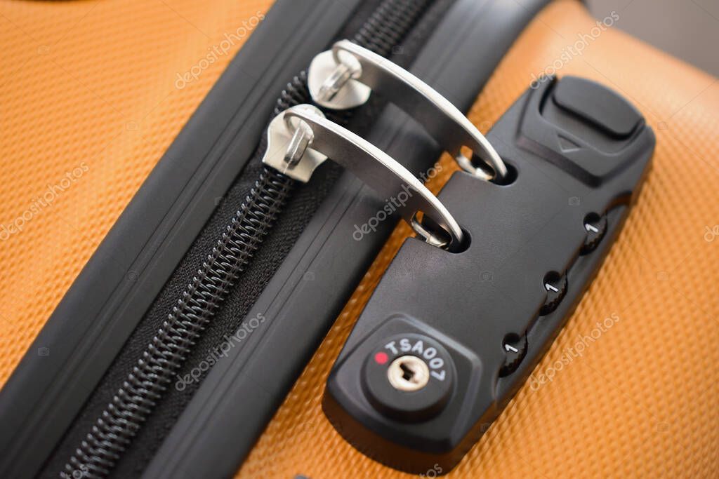 TSA accepted lock on luggage bag or suitcase (Transportation Security Administration of US). Response to the September 11 attacks. Air travel safety.