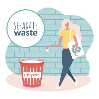 Ekoloji torbası olan genç kadın çöpü ayırıyor