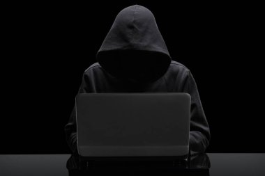 hacker sitting at the desk with clipping path around the subject and copy space for your text